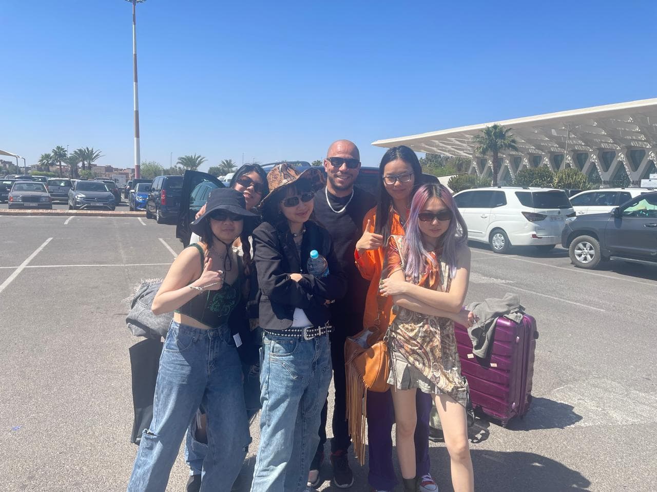 Haitam with tourists at Marrakech airport